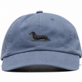 Washed-blue cotton Dachshund Cap with an embroidered black-and-tan dachshund, front view on a white background