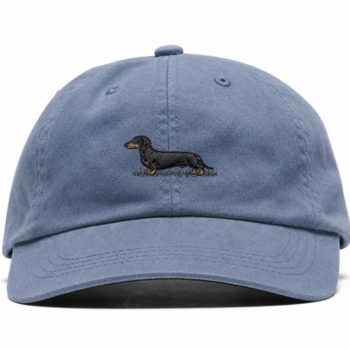 Washed-blue cotton Dachshund Cap with an embroidered black-and-tan dachshund, front view on a white background
